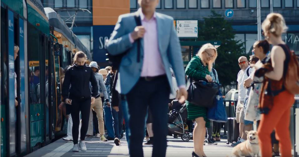 People walking on a busy train station in Finland