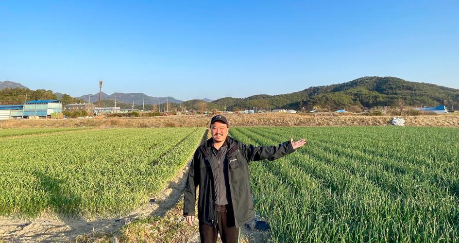Korean farmer in field
